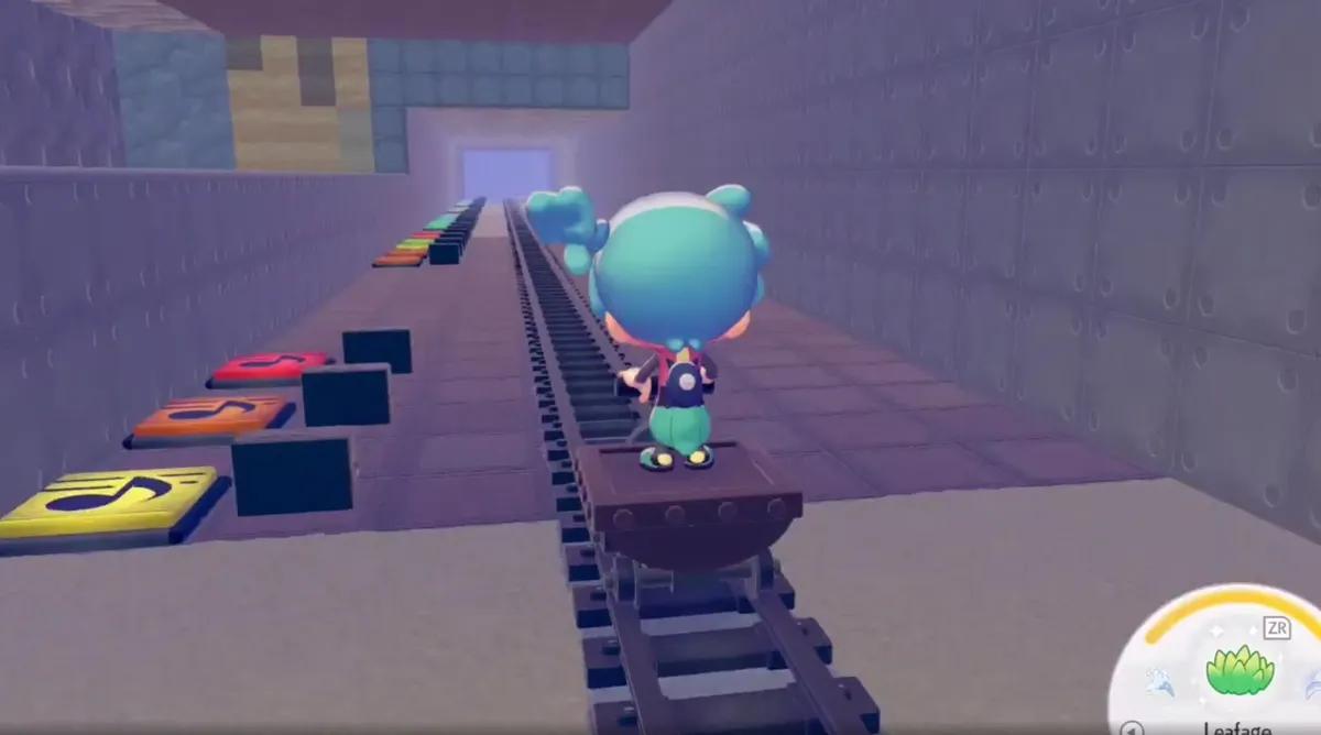 Gracz Pokopii buduje zabawną pułapkę Rickroll, wykorzystując kreatywne narzędzia gry